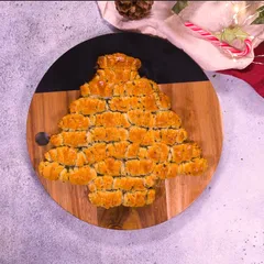Sapin feuilleté apéritif au beurre d'ail et persil