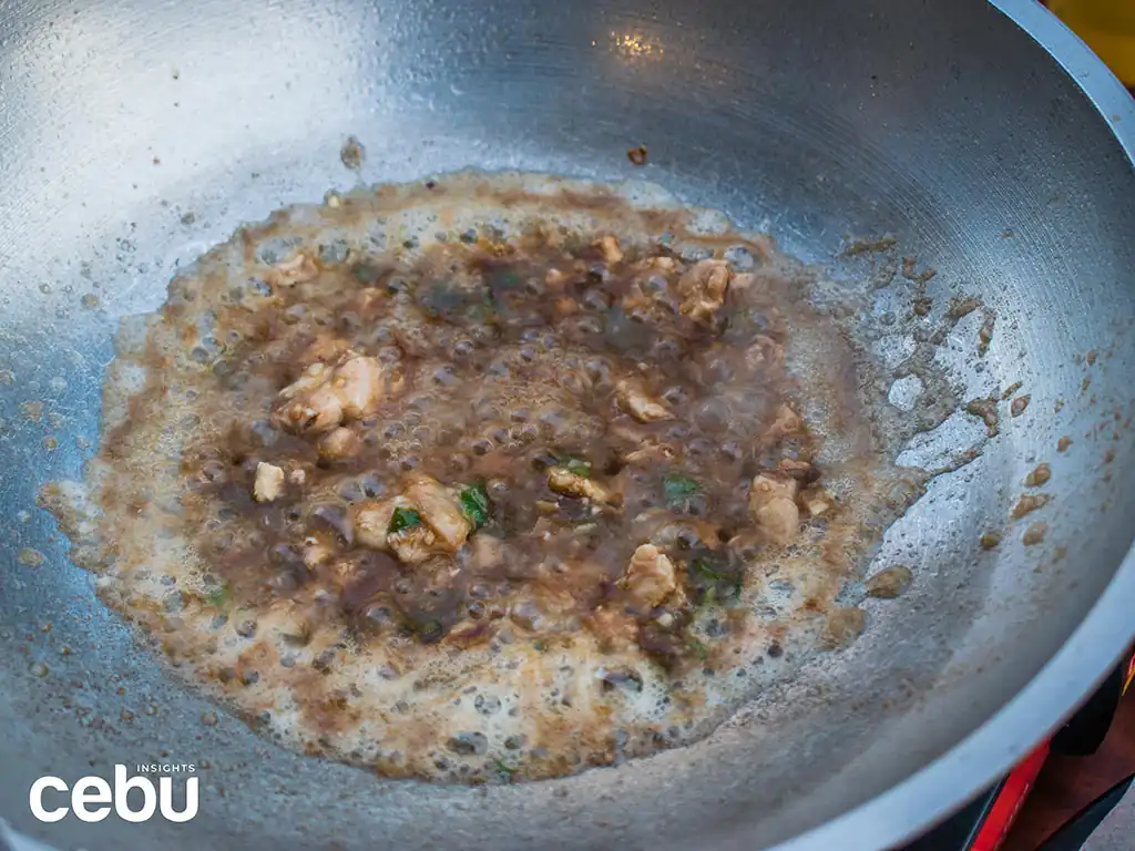 Big Brain-15 Closeup of a wok with Tuslob Buwa