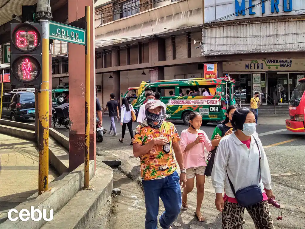 Cebuanos walking around downtown Cebu, which is sought for pedestrianization