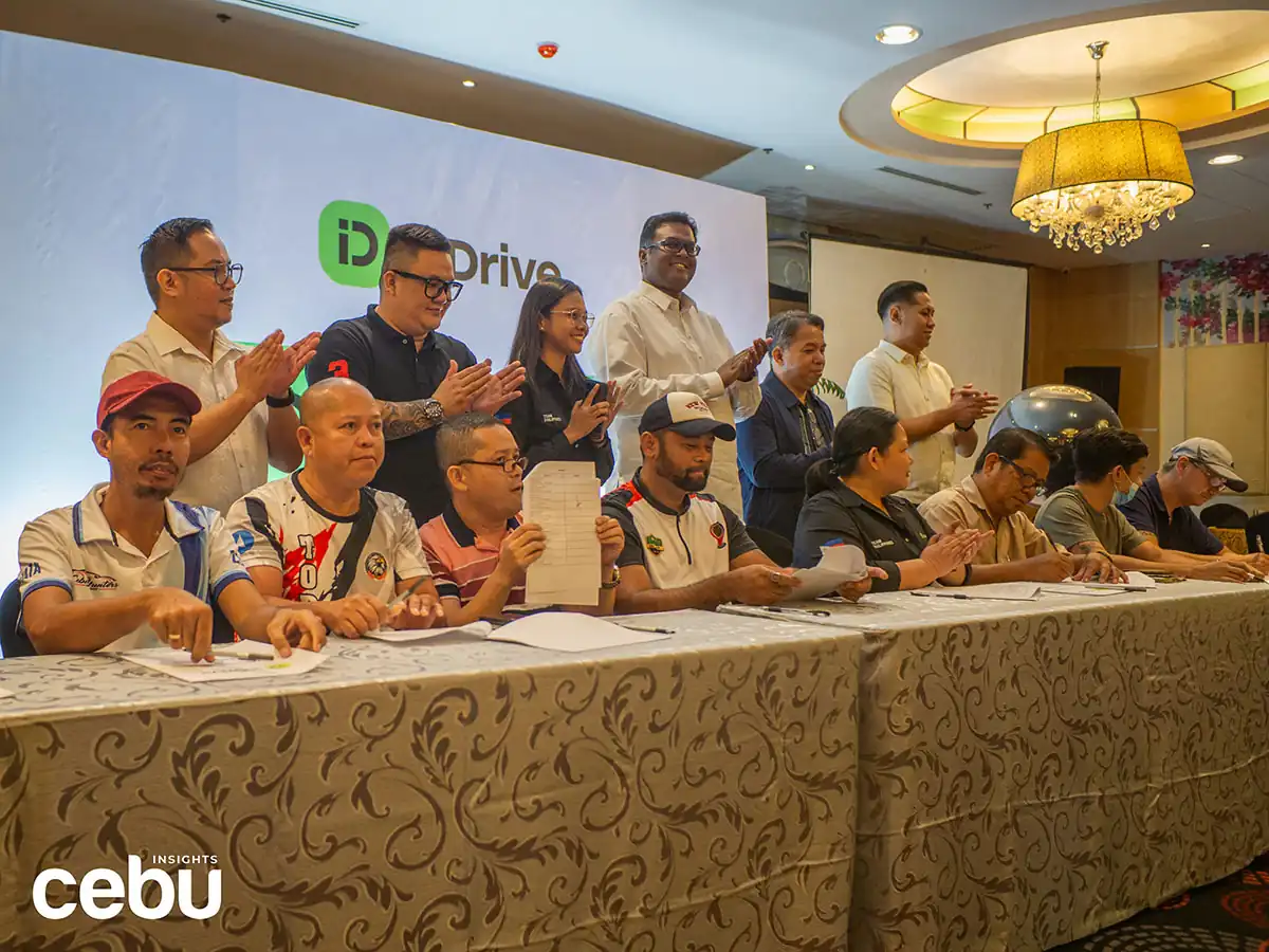 TNVS drivers with officials from InDrive Philippines