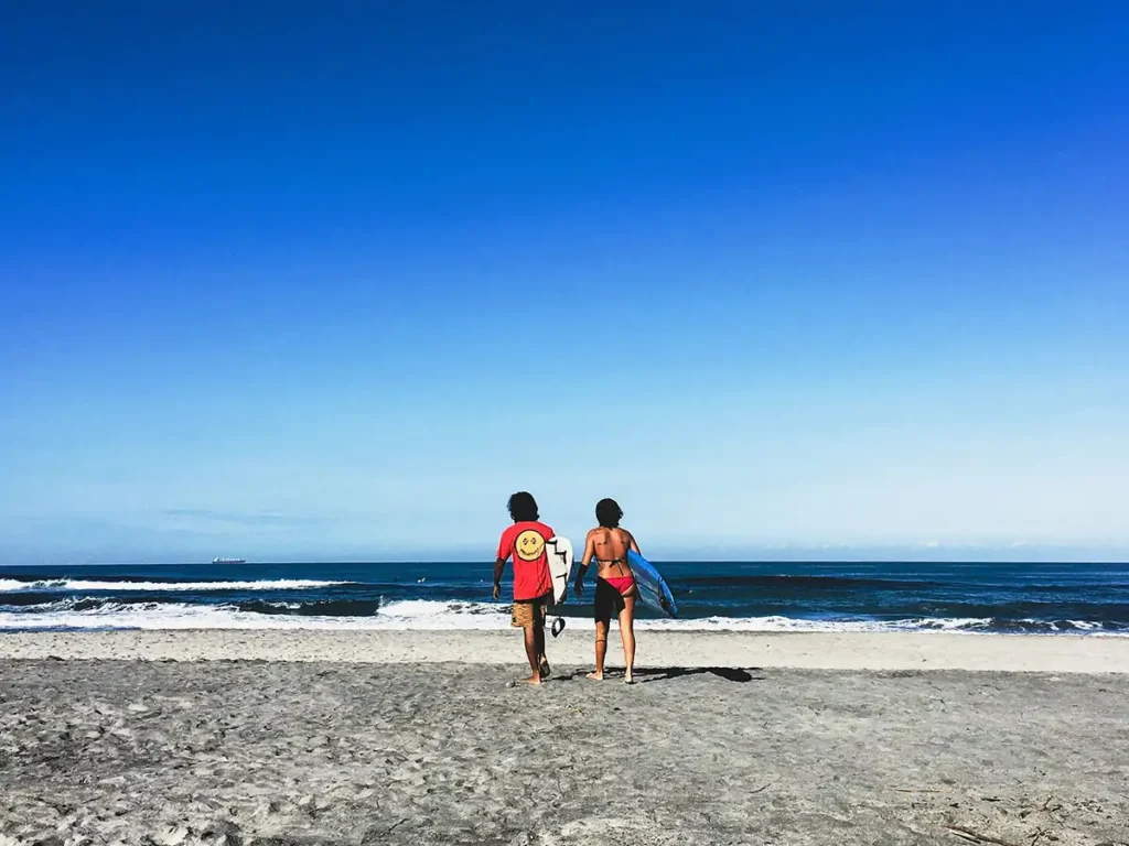 Two surfers at one of the surf spots in the Philippines