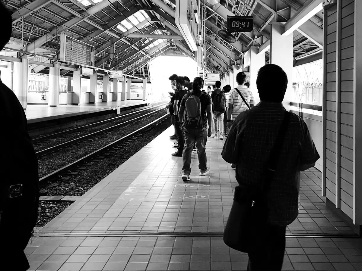 Men walking at a subway system