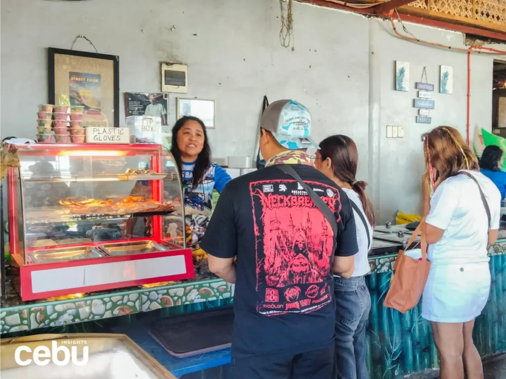 Customers lining up to get some bakasi eel at Entoy’s