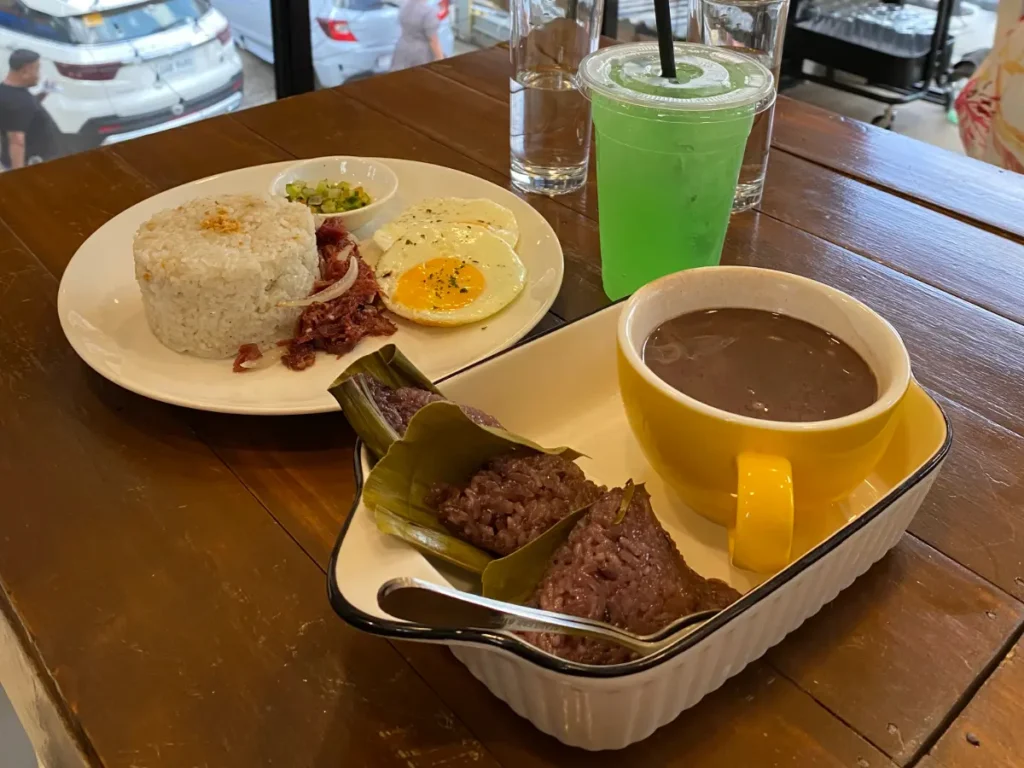 A plate of corned beef with egg and rice and puto sikwate from Pamahaw Cafe