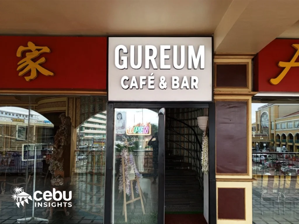The clandestine entrance of Gureum Cafe & Bar with a signage saying they’re open