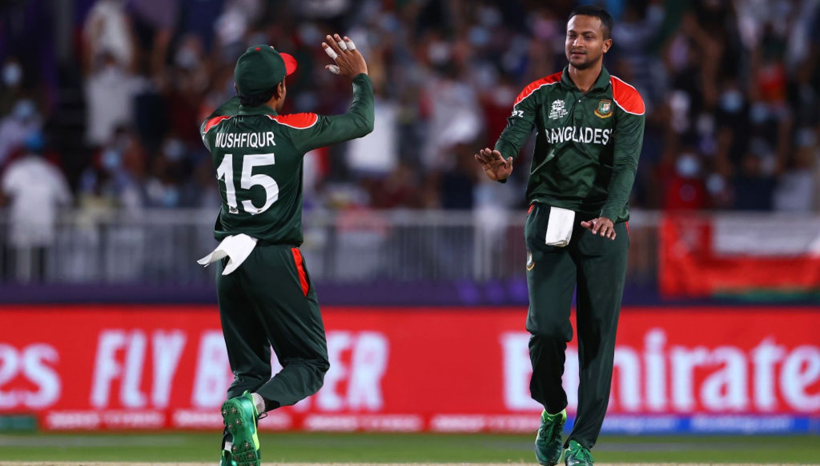 Man of the Match Mohammad Shahid and Shakib Al Hasan share a