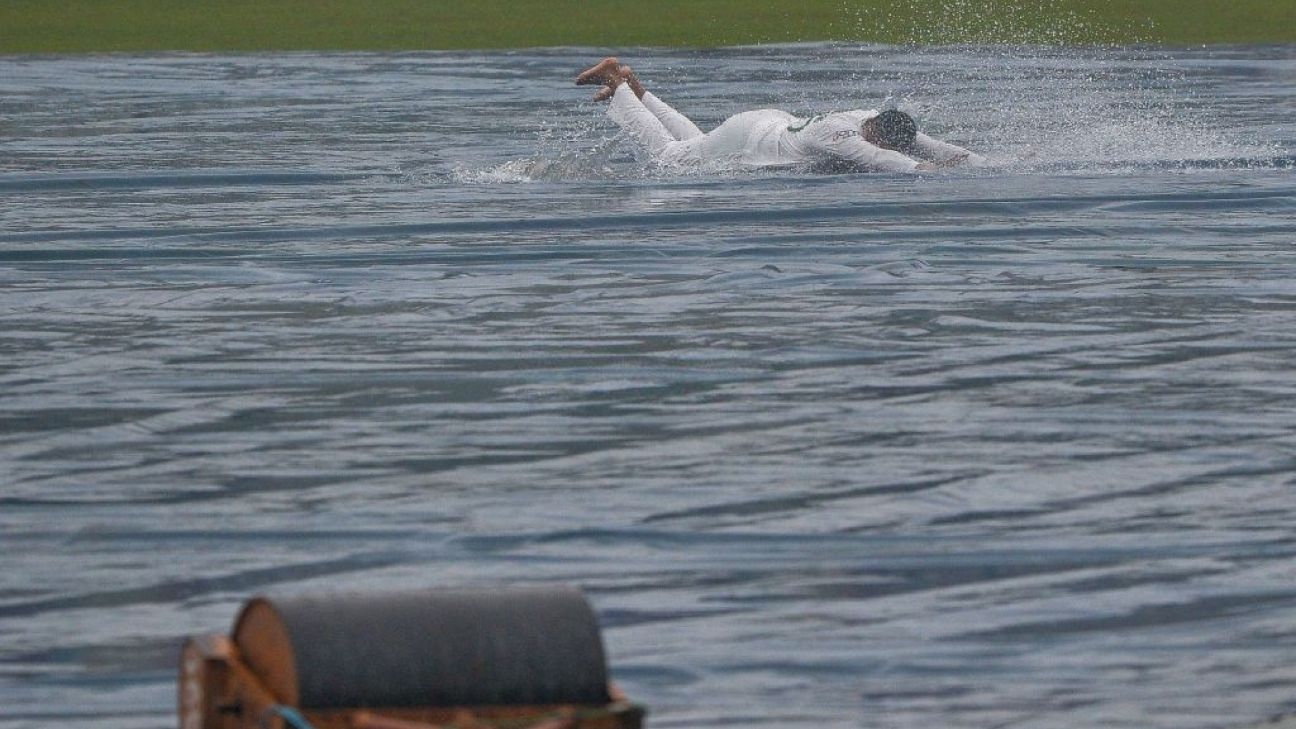 Watch: Shakib dives off the pitch covers in a childlike fashion as rain disturbs day-2 of 2nd Test