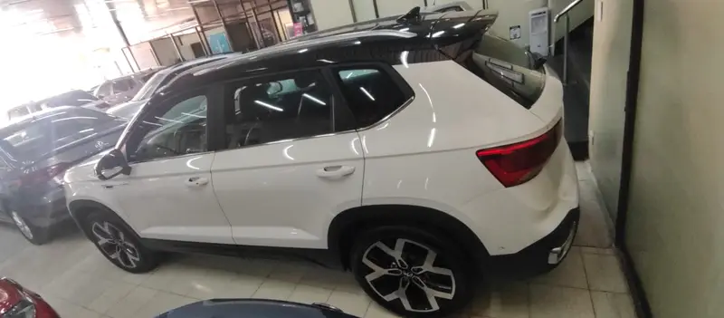 Volkswagen TAOS TAOS 1,4 250 TSI HIGHLINE A/T BITONO 2024