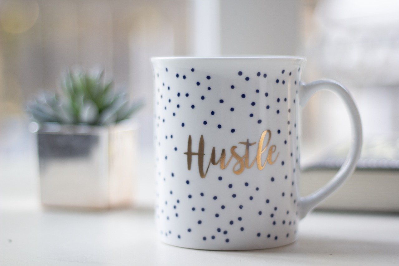 hustle-4975517_1280 mug with hustle text on it