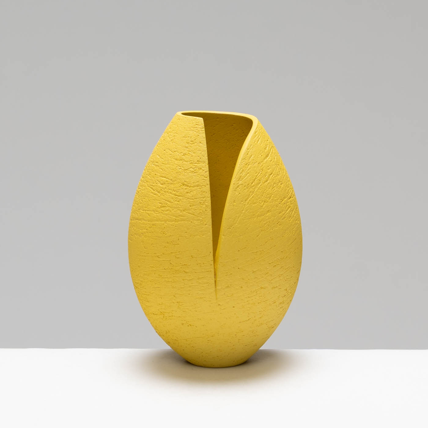 ASH259X83 Yellow Cut and Altered Pinch Pot