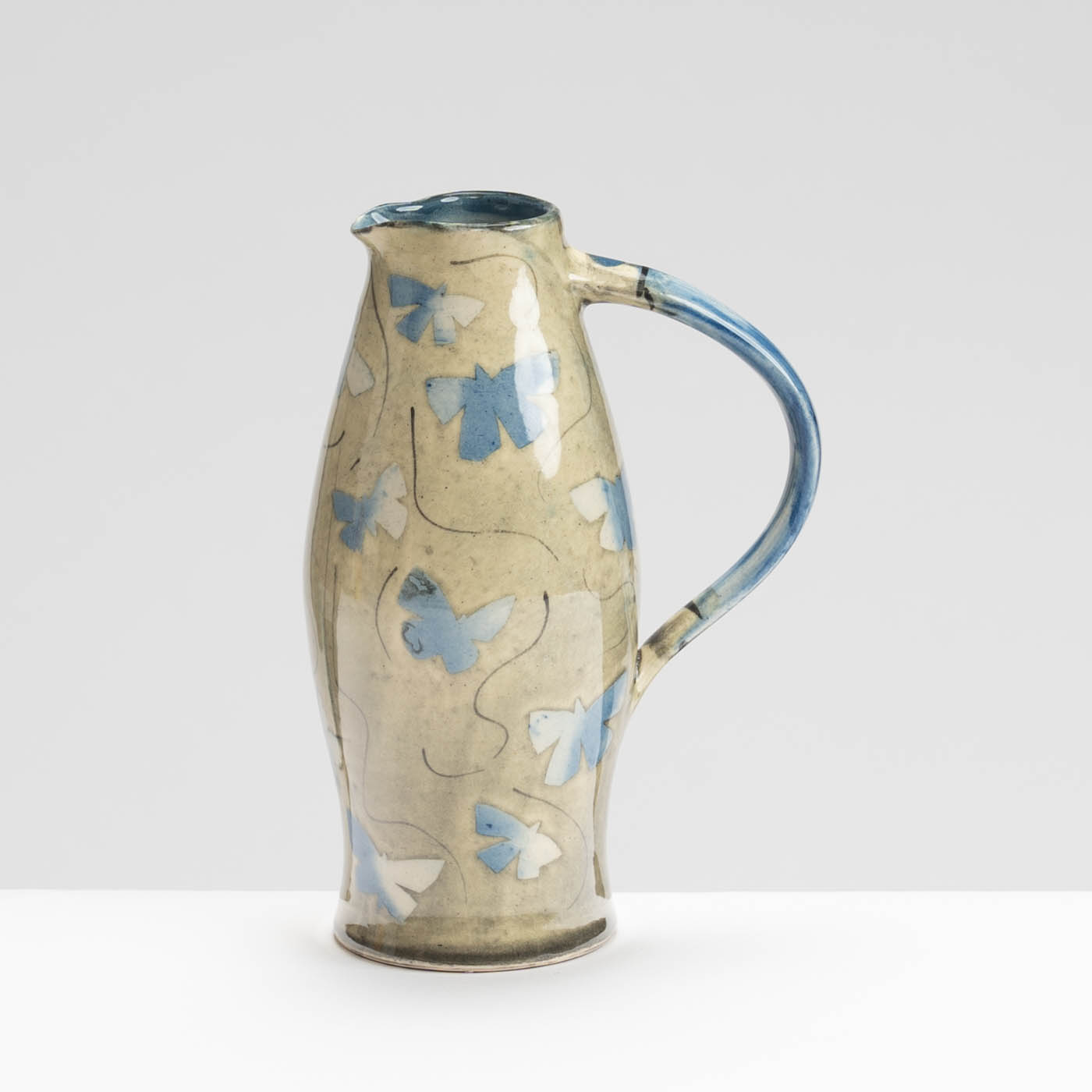 SM242Y1031 Small Curved Jug - Blue butterflies on grey