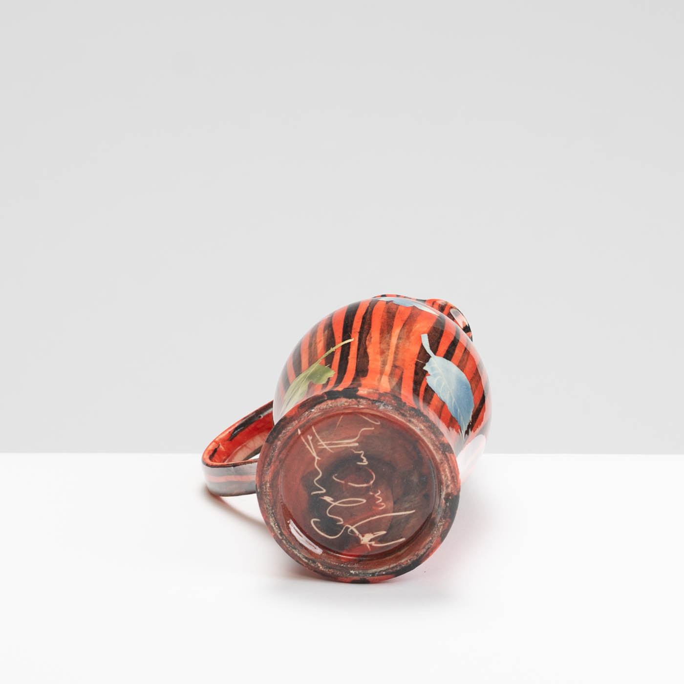 SM242Y1028 Small Curved Jug - Red stripes, leaves and butterflies