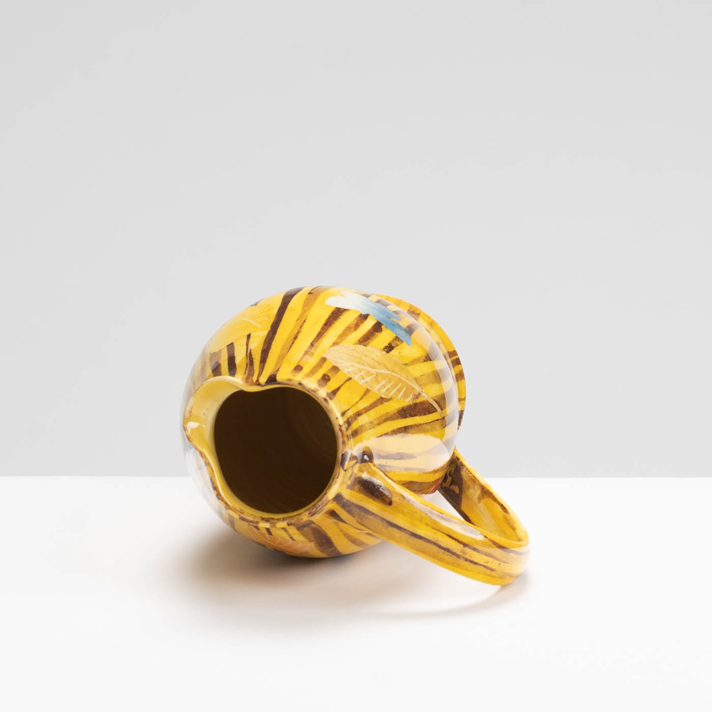 SM242Y1029 Small Curved Jug - Yellow stripes, leaves and butterflies