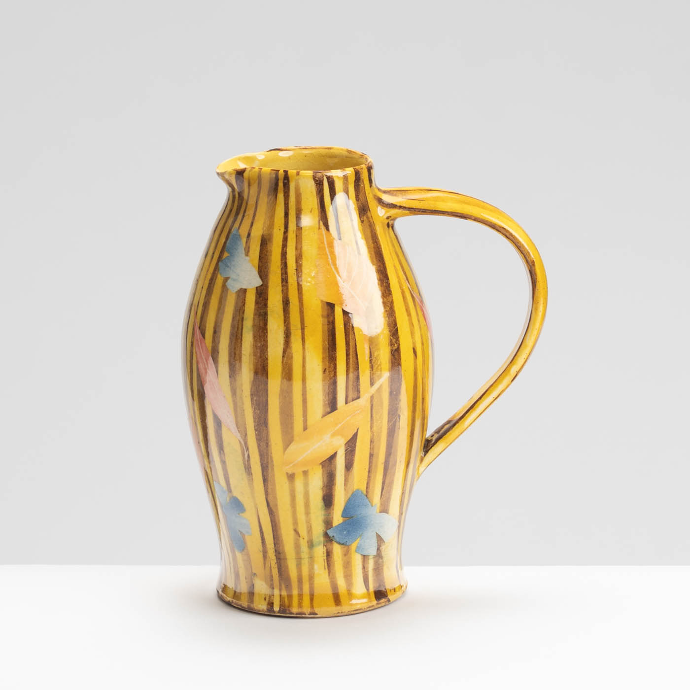 SM242Y1029 Small Curved Jug - Yellow stripes, leaves and butterflies
