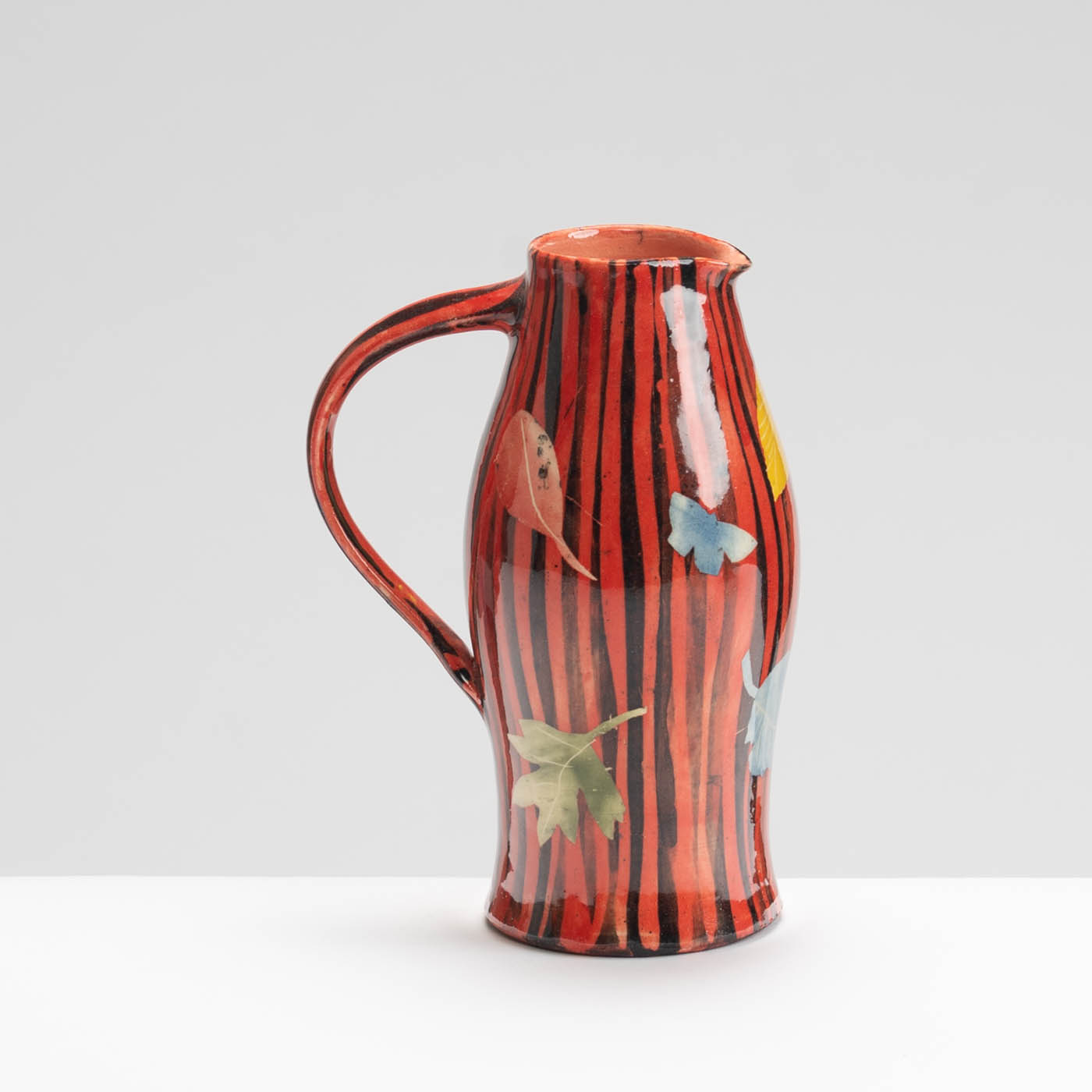 SM242Y1028 Small Curved Jug - Red stripes, leaves and butterflies
