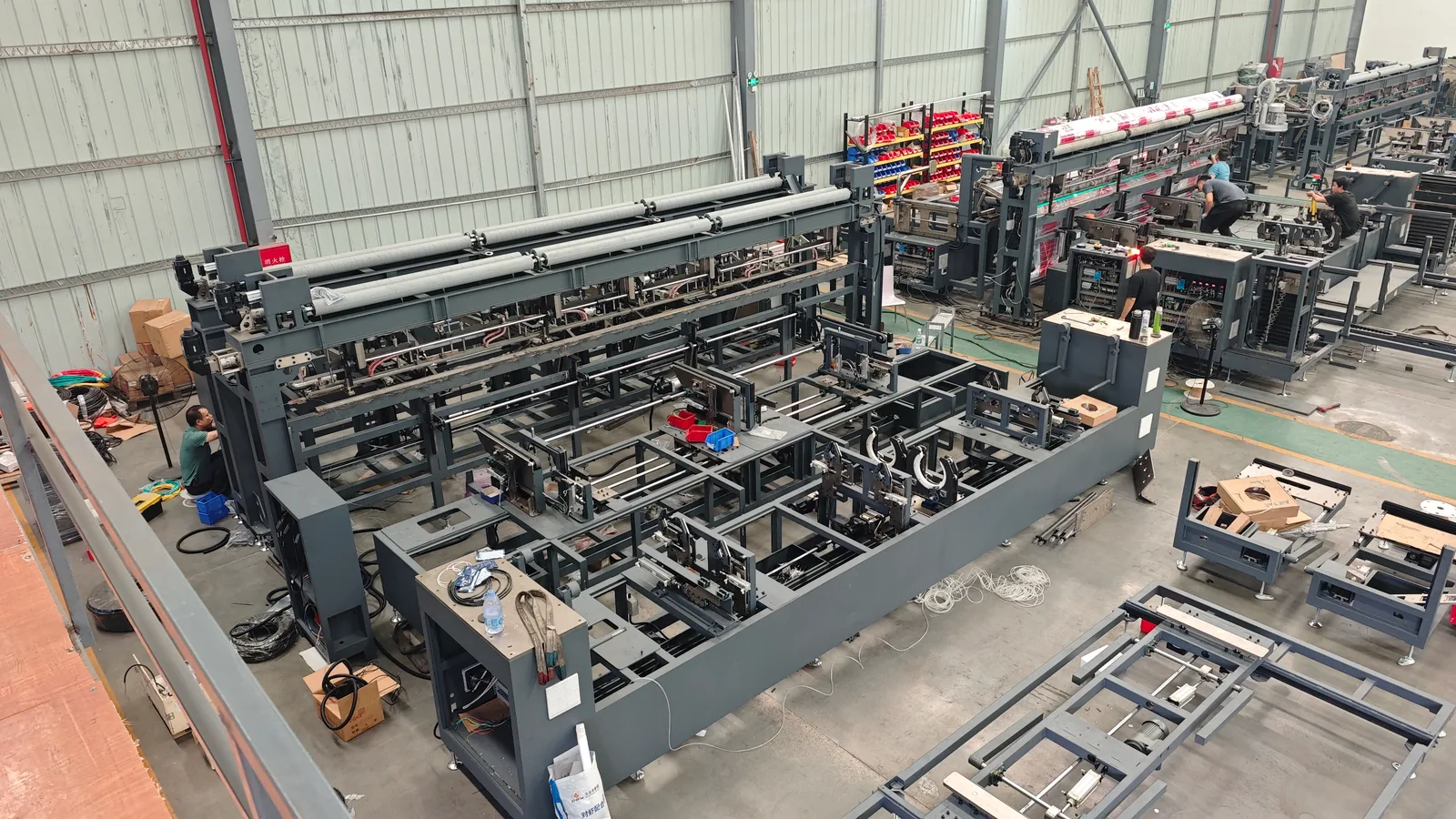 Elevated view of packaging equipment and its surrounding workshop