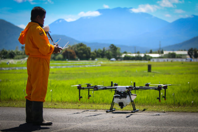 Drones take the drudgery out of sowing rice. Photo: IRRI.