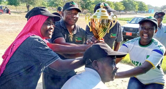 Celebrations after winning a trophy in a category of research institute and services.