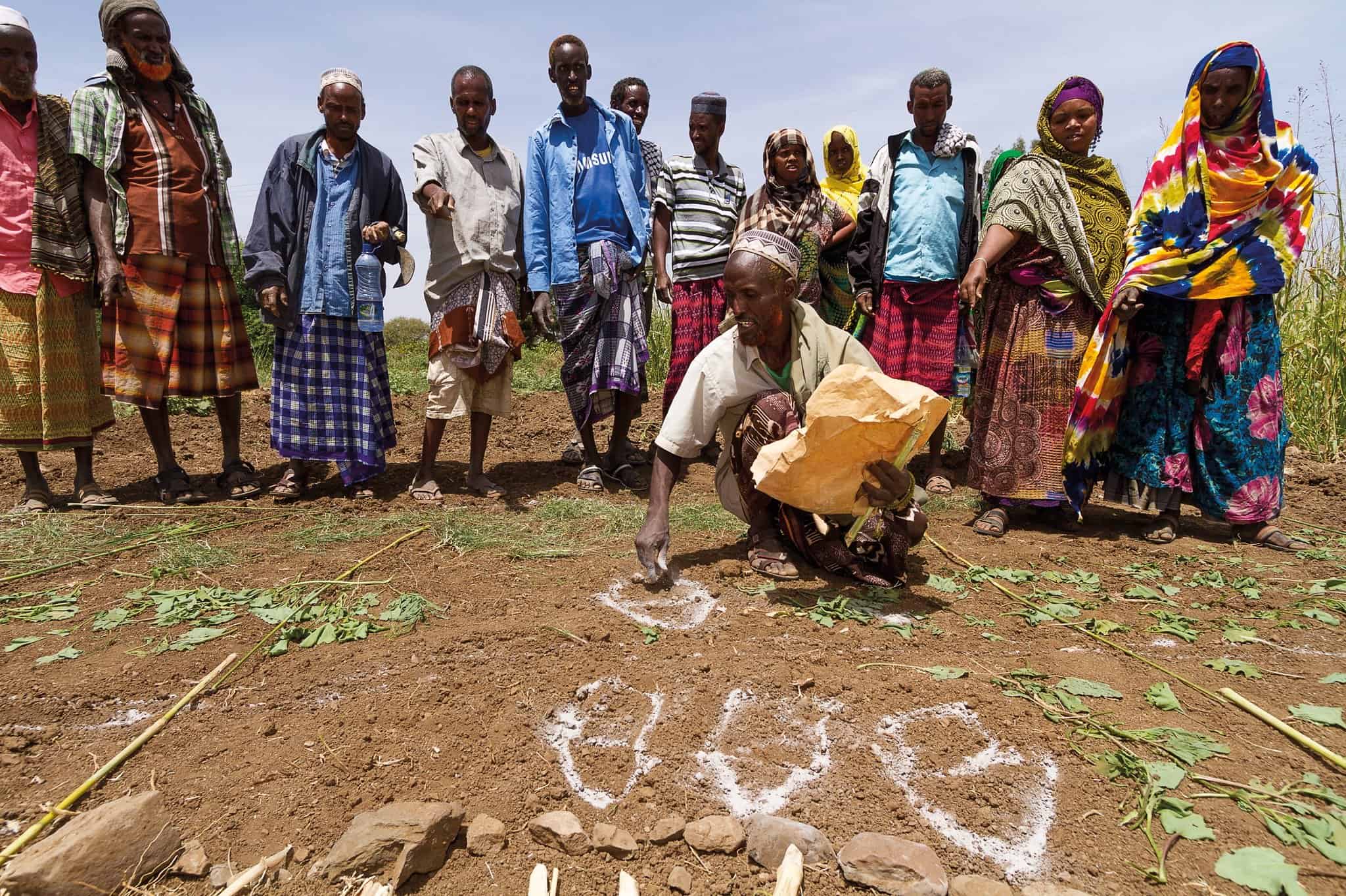 Pastoralist community from Fentale woreda, Ethiopia, Karayu, mapping their use of rangelands and rangeland resources as part of participatory rangeland management (photo credit: PRIME/Kelley Lynch).