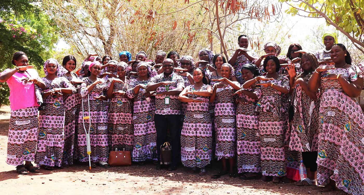 The staff posing with the theme gesture of the International Women’s Day 2020. Photo: ICRISAT