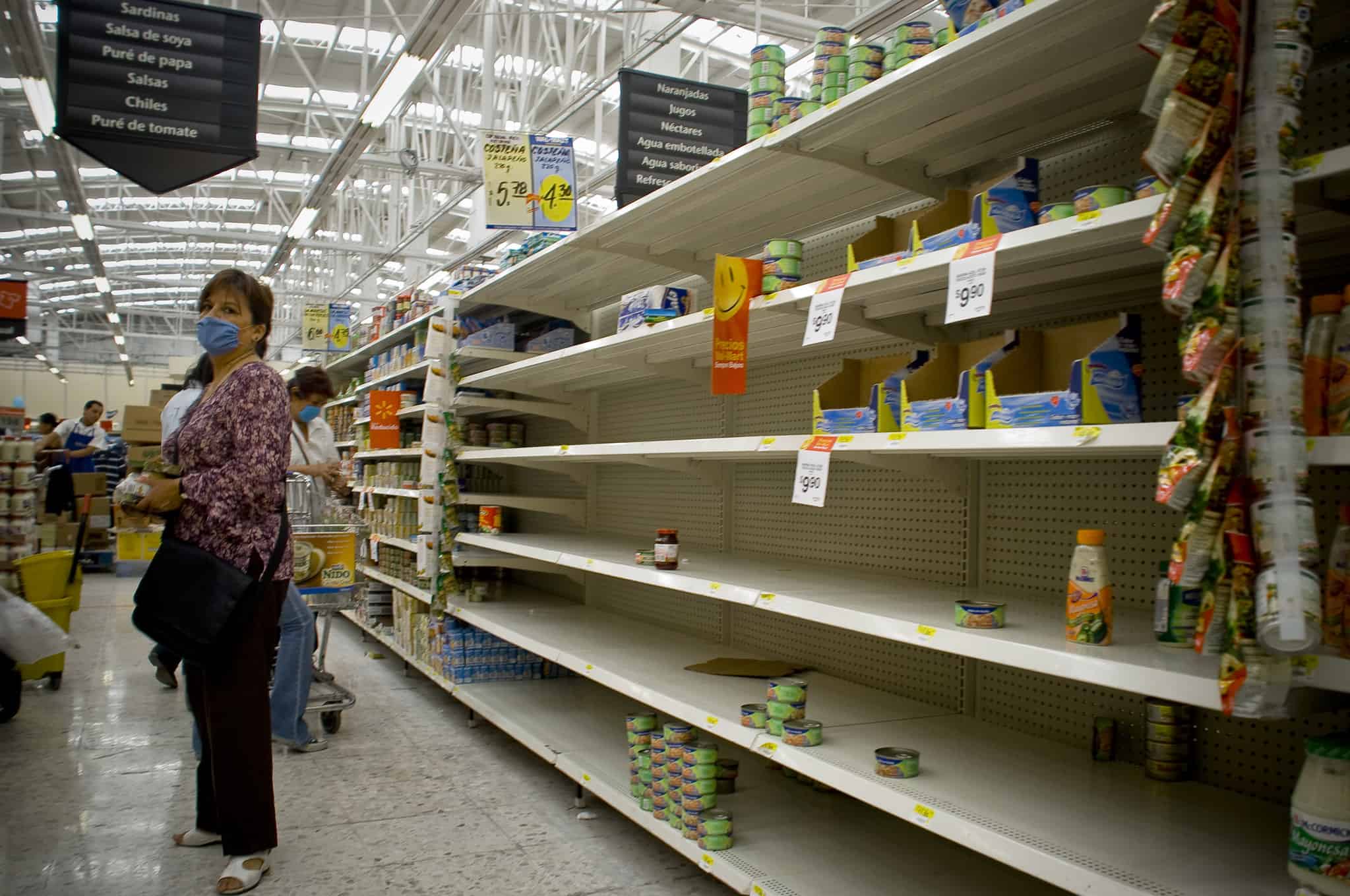 Shoppers stock up on food supplies in reaction to news of spreading disease