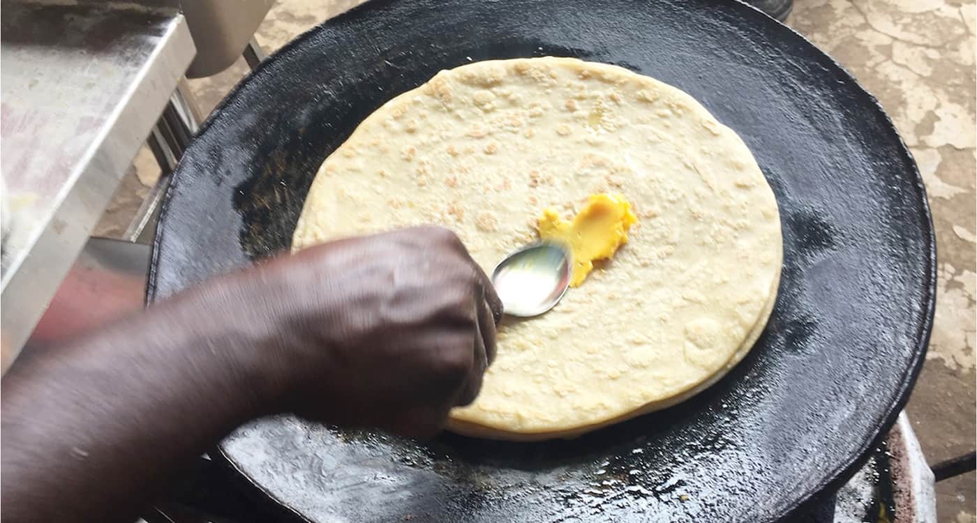 A chapati could get out of reach for people who fall short in income in response to their sudden inability to walk to work. Photo: Michael Hauser
