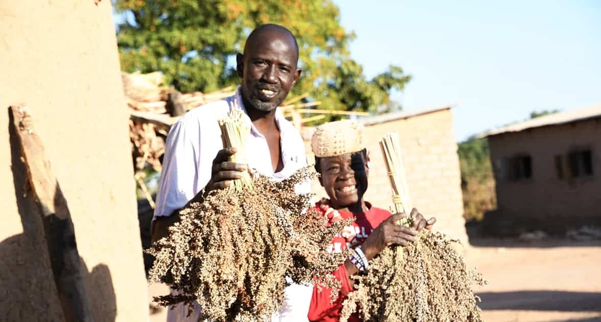 Farmer Bourama Bougodogo with his mother outside their home. Photo: N Diakite and S Touré, ICRISAT