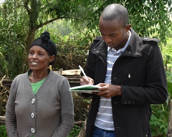 Phillip Miriti (in black) during a field interview in Ethiopia.