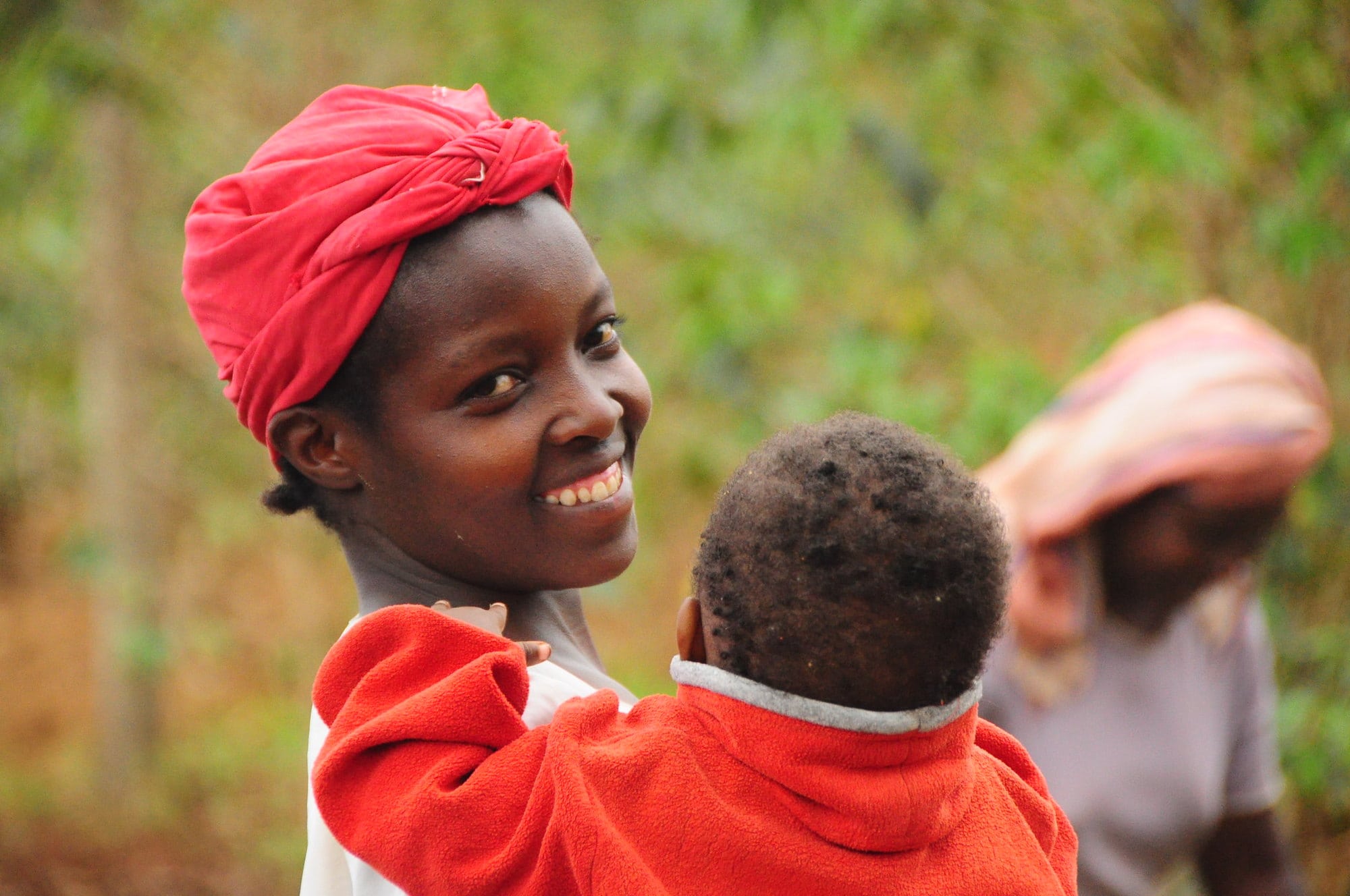 Woman with child in Kenya.