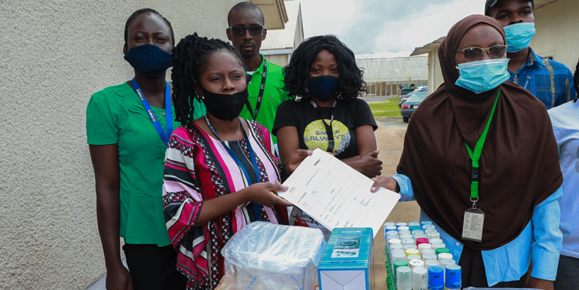 GoSeed’s Mercy Diebiru-Ojo (left) receiving 42 plant form temporary immersion bioreactors (TIS) and 40 plantlets from YIIFSWA’s Morufat Balogun.