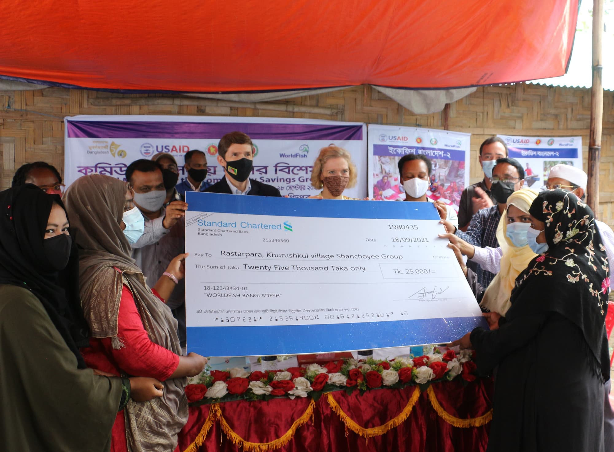 Community savings groups (CSG) receive matching grants. Photo by Md. Asaduzzaman