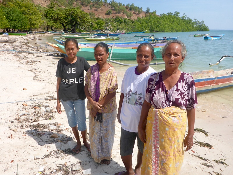 Women play a critical role in aquatic food supply chains, though they typically perform informal postharvest activities like fish processing and trade, so their contributions are persistently undervalued. Photo by Kate Bevitt.