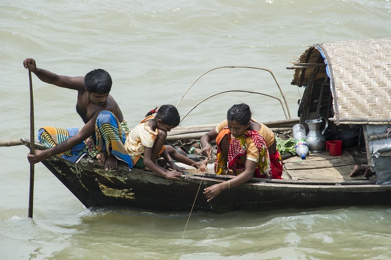 : A family fishes in Chandpur, Bangladesh. Photo by Finn Thilsted.