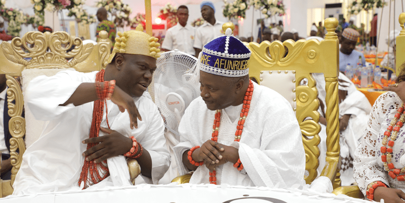 The Ooni of Ife, His Imperial Majesty, Oba Enitan Adeyeye, Ojaja II, speaking with the newly conferred Chief Nteranya Sanginga.