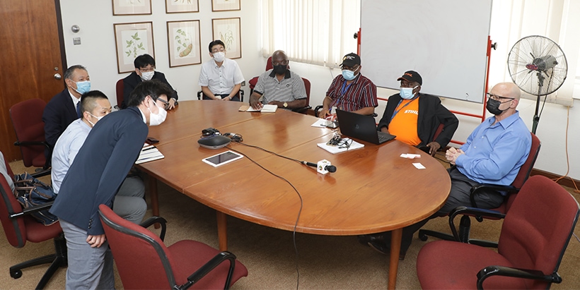 The Honda and IITA Management teams holding a conversation.