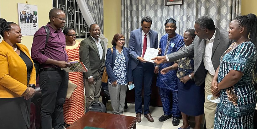 The meeting participants including the Honorable Minister Hussein Mohamed Bashe, flanked by Dr Leena Tripathi (fifth from left) and Prof. Lateef Sanni (fourth from right).