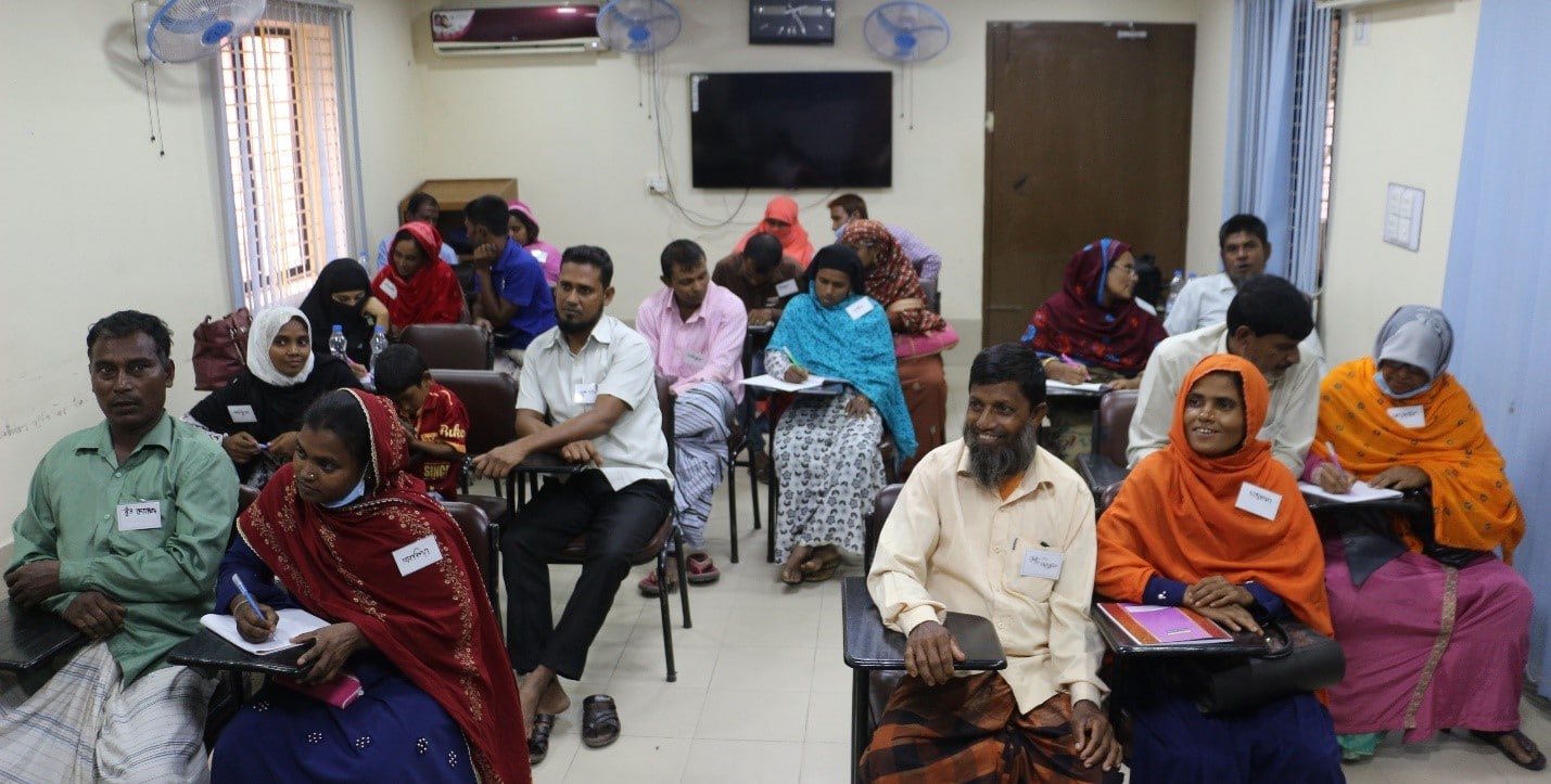 Couples attending a business development training session. Photo by Maherin Ahmed.