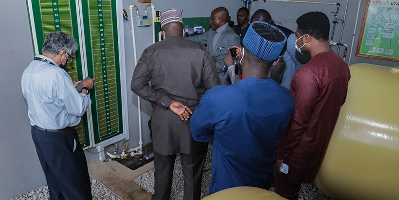 The NCEEC team on a tour of IITA Biogas facility.