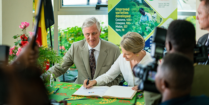 King Philippe and Queen Mathilde signing the guestbook