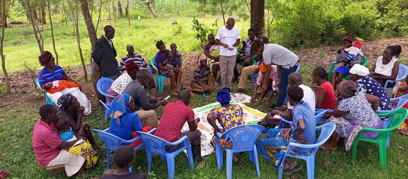 Participants from Kiriko C.U trying out the game, Teso North, Busia County, Kenya. Photo credit: Save the Children, Bungoma office