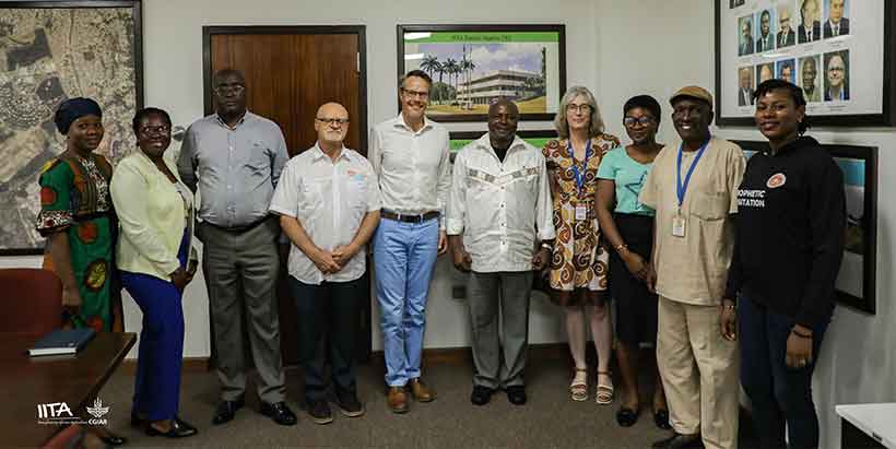 Andre Zandstra in a group photograph with Dr Sanginga, Dr Dashiell, Hilde Koper and some IITA staff