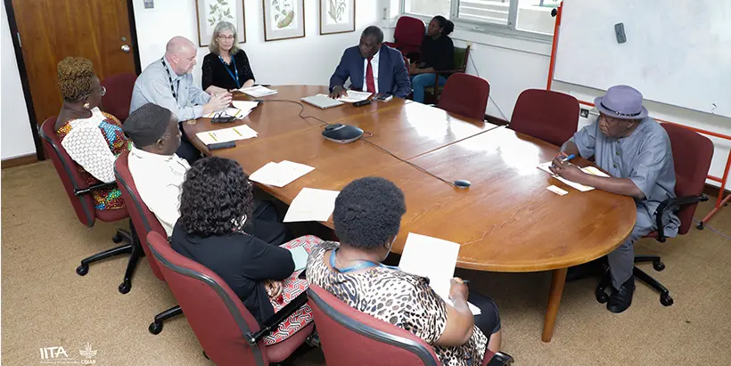 Hon. Mbairobe meeting with the IITA Management team.