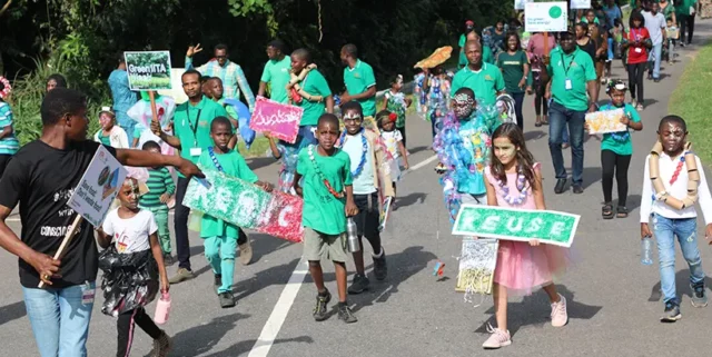 A campus-wide carnival procession featuring colorful displays from participants.