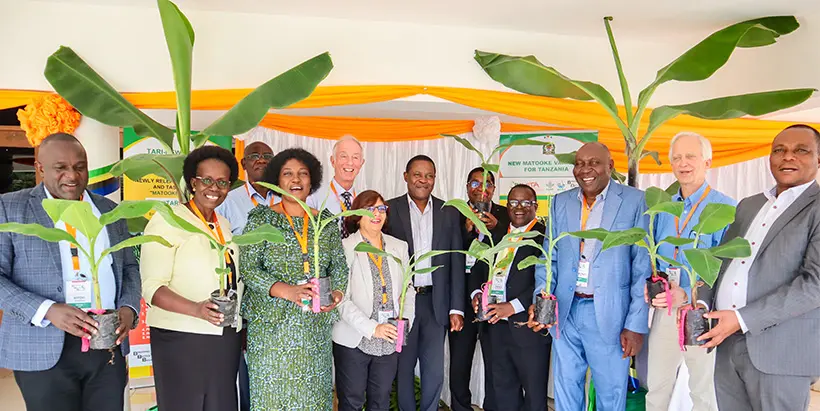 Banana researchers, with Tanzania government officials and a farmer, during the ABBB Annual Meeting and release of TARIBAN hybrids in Arusha, Tanzania. Photo: IITA/G.Ndiblema