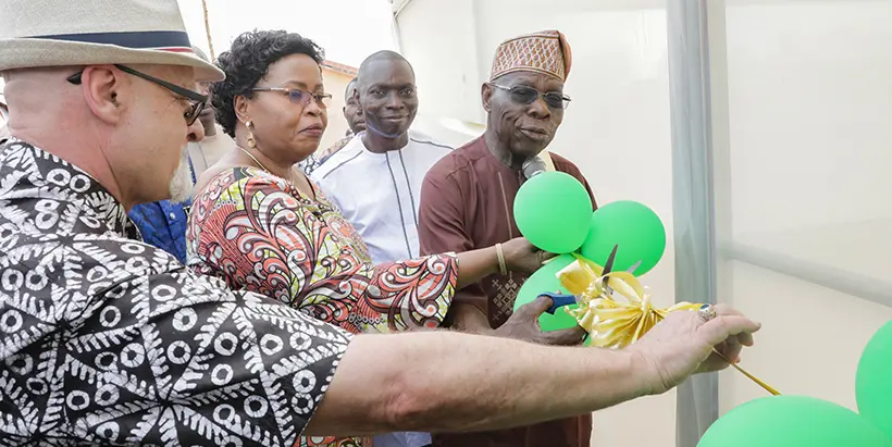 IITA Goodwill Ambassador, former President Olusegun Obasanjo, cutting the ribbon to launch the IITA-implemented screenhouse at Obasanjo Farms Nigeria.