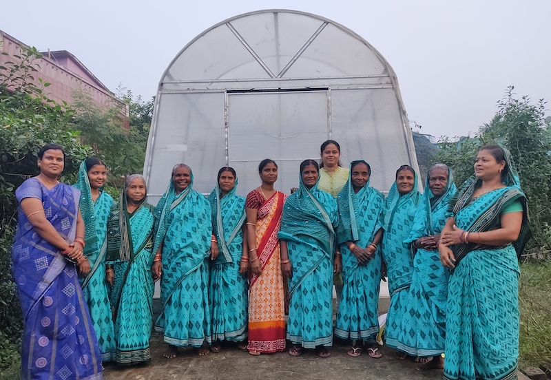 Neetha Shenoy (in light green) posing with the Women Self-Help Group of Jagatsingpur district, Odisha involved in hygienic dried fish production using a solar dryer. Photo by Sourabh Kumar Dubey.