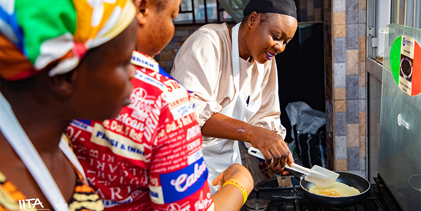 A participant trying out the rice pancake recipe at the training in Ebonyi State, Nigeria.