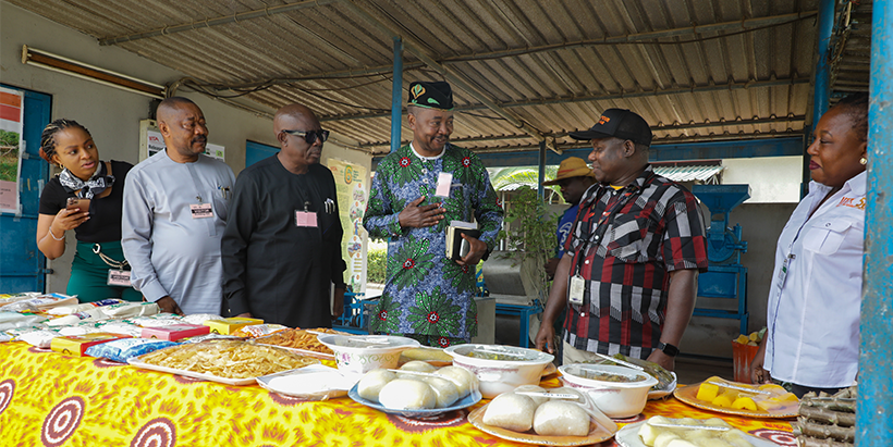 Peter Iluebbey, IITA’s International Trials Manager, Cassava Breeding, enlightening the team from PAP on cassava’s vast varieties, value chain, by-products, and nutritional and health benefits.