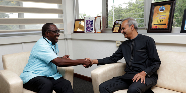 IITA Director General Dr Ehui welcomes Dr Chaudhuri to the institute’s headquarters.