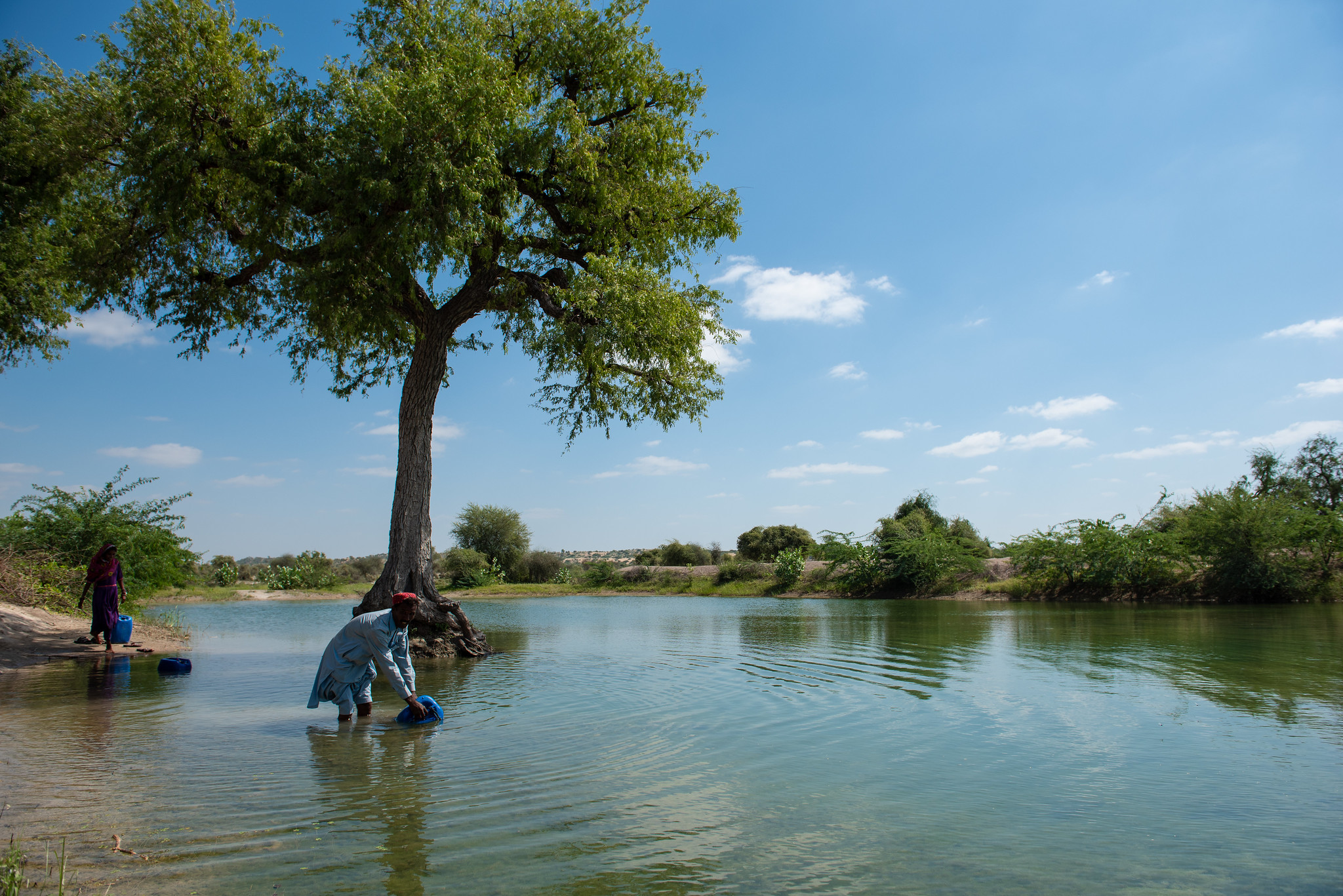 Collecting water for household use near Chilhar, Tharparkar, Sind, Pakistan